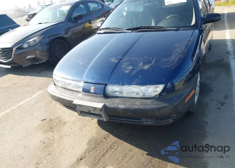 1999 Saturn Sl1 z USA, uszkodzony, nr VIN 1G8ZH5289XZ168171